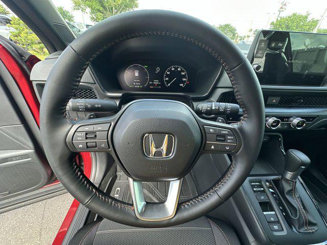 Photo of 2026 Radiant Red Metallic Honda CR-V Hybrid