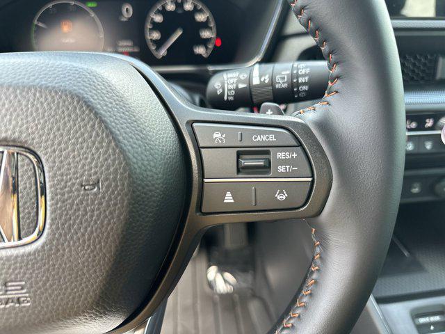 Photo of 2026 Radiant Red Metallic Honda CR-V Hybrid