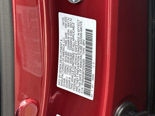 Photo of 2026 Radiant Red Metallic Honda CR-V Hybrid