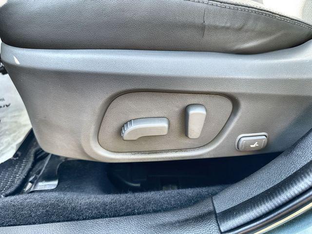 Photo of 2015 Jasmine Green Metallic Subaru Forester
