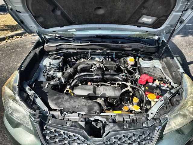 Photo of 2015 Jasmine Green Metallic Subaru Forester