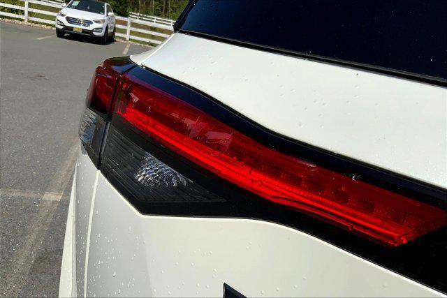 Photo of 2023 Pearl White Tricoat/Super Black Nissan Pathfinder
