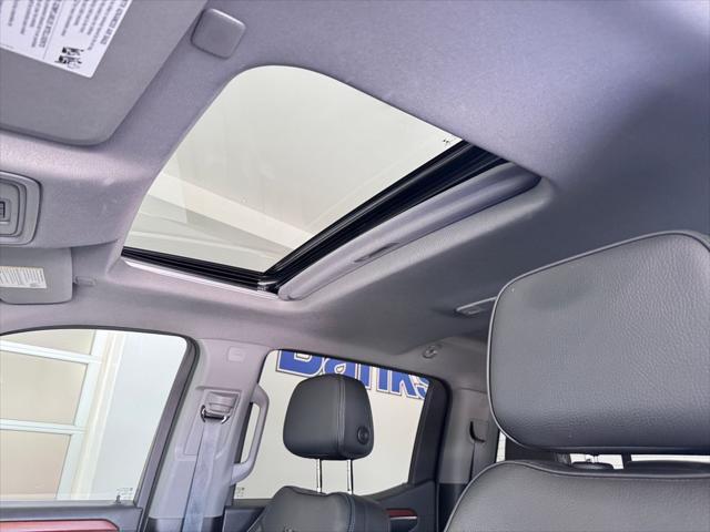 Photo of 2023 White Frost Tricoat GMC Sierra 1500