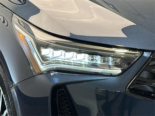 Photo of 2025 Canyon River Blue Metallic Acura RDX