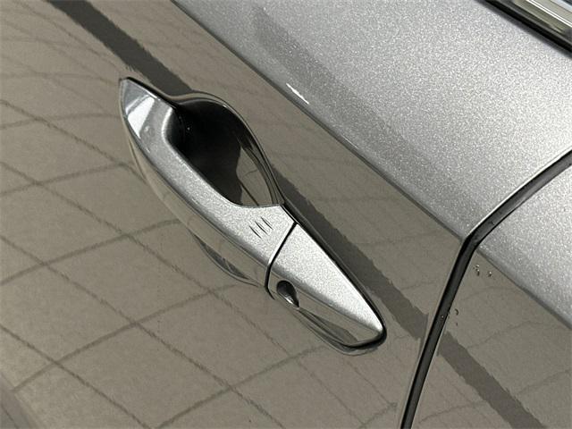 Photo of 2025 Liquid Carbon Metallic Acura MDX