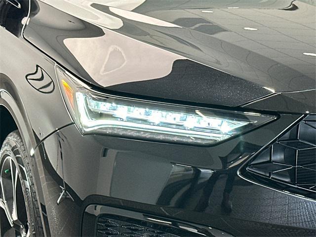 Photo of 2025 Majestic Black Acura MDX