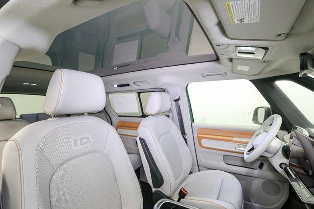 Photo of 2025 Mahi Green Metallic - Candy White Volkswagen ID. Buzz