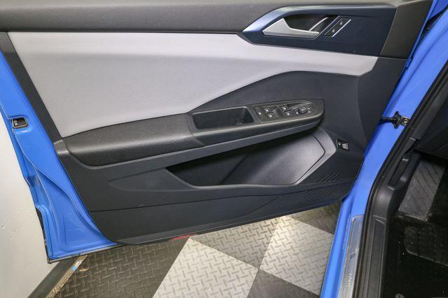Photo of 2023 Cornflower Blue Volkswagen Taos