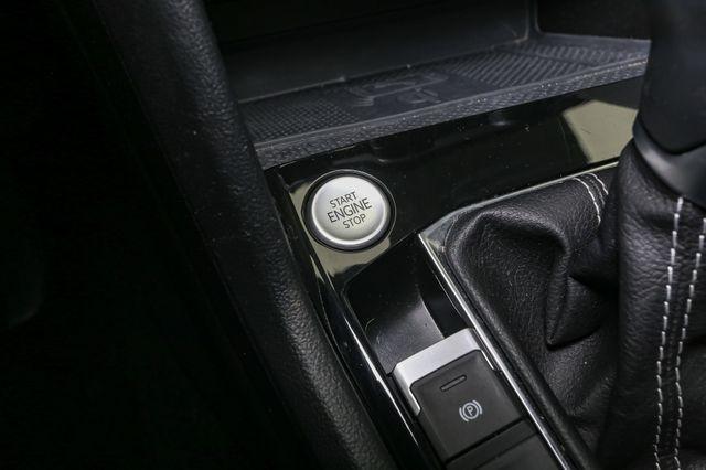 Photo of 2023 Cornflower Blue Volkswagen Taos