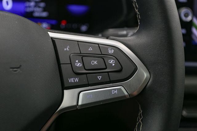 Photo of 2023 Cornflower Blue Volkswagen Taos