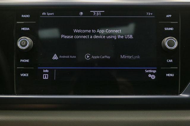 Photo of 2023 Cornflower Blue Volkswagen Taos
