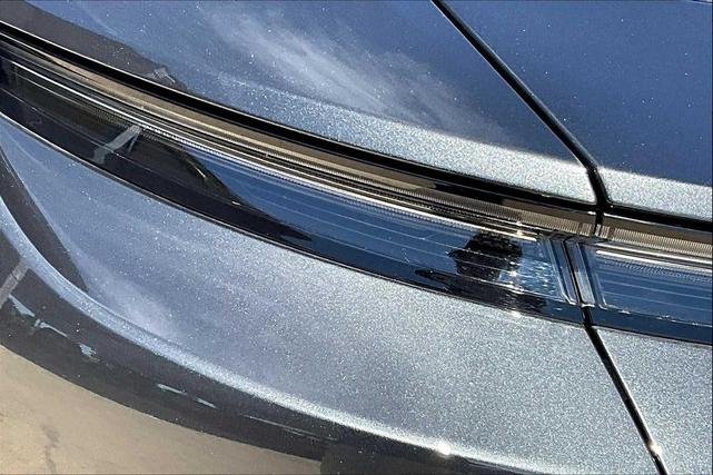 Photo of 2024 Volcano Grey Metallic Porsche Taycan