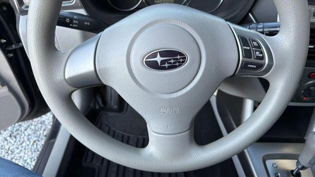Photo of 2011 Dark Gray Metallic Subaru Forester