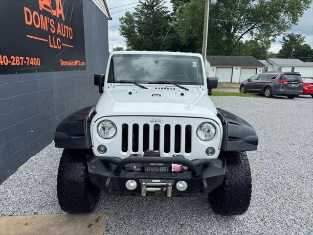 Photo of 2014 Bright White Clearcoat Jeep Wrangler Unlimited