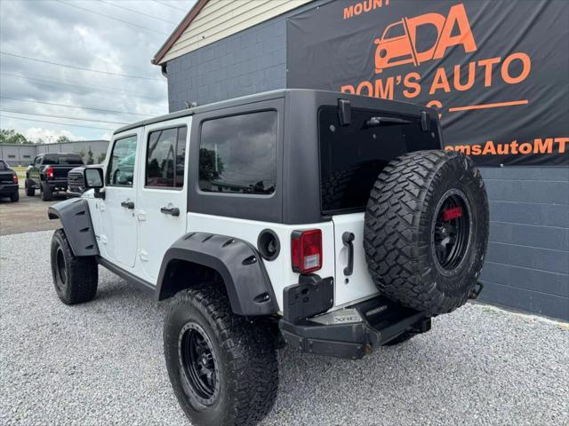 Photo of 2014 Bright White Clearcoat Jeep Wrangler Unlimited