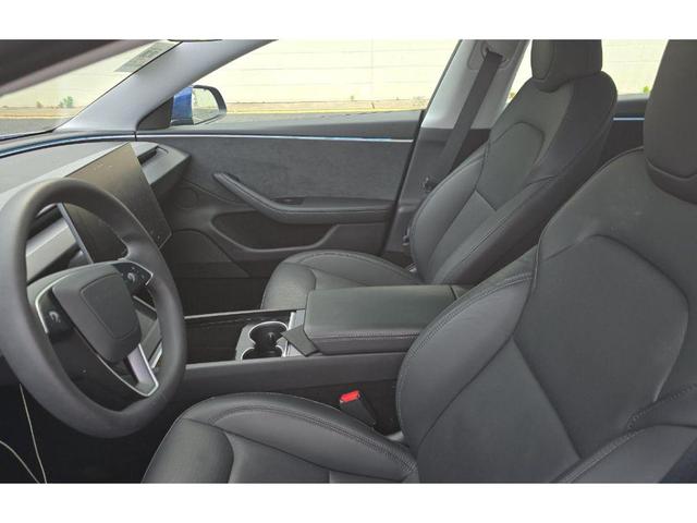 Photo of 2024 Deep Blue Metallic Tesla Model 3