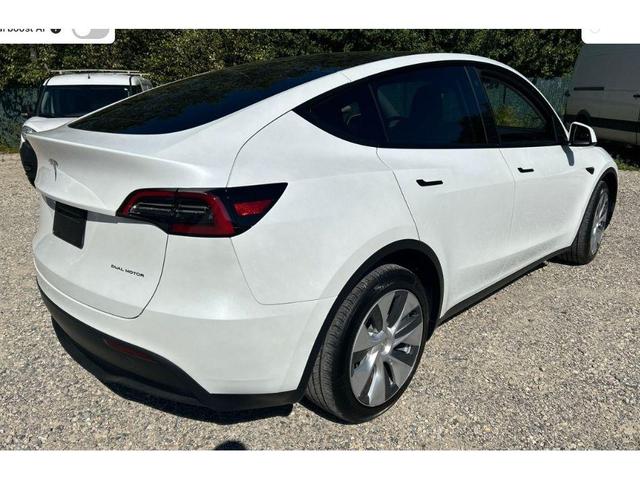 Photo of 2023 Pearl White Multi-Coat Tesla Model Y