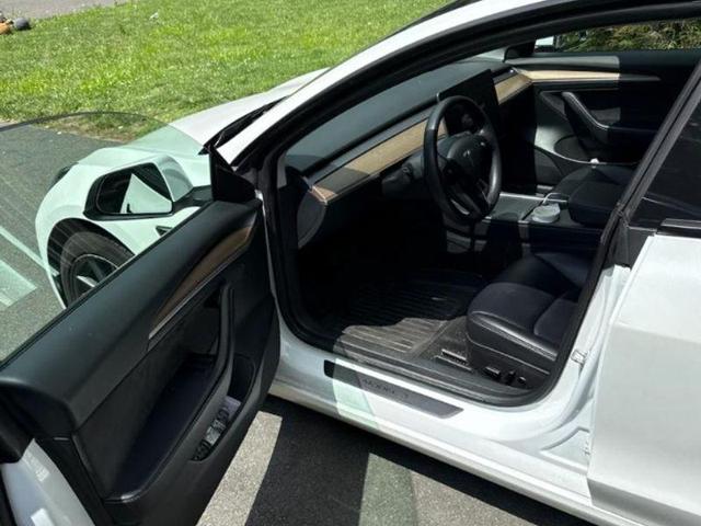 Photo of 2023 Pearl White Multi-Coat Tesla Model 3
