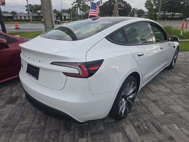 Photo of 2025 Pearl White Multi-Coat Tesla Model 3