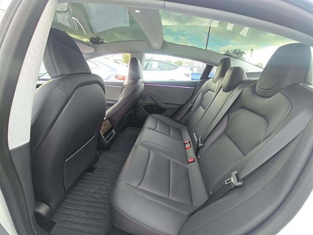 Photo of 2025 Pearl White Multi-Coat Tesla Model 3