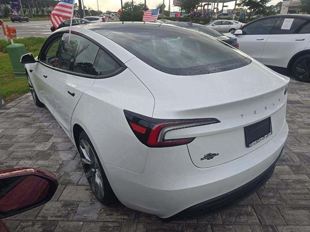 Photo of 2025 Pearl White Multi-Coat Tesla Model 3