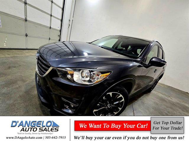 Photo of 2016 Meteor Gray Mica Mazda CX-5