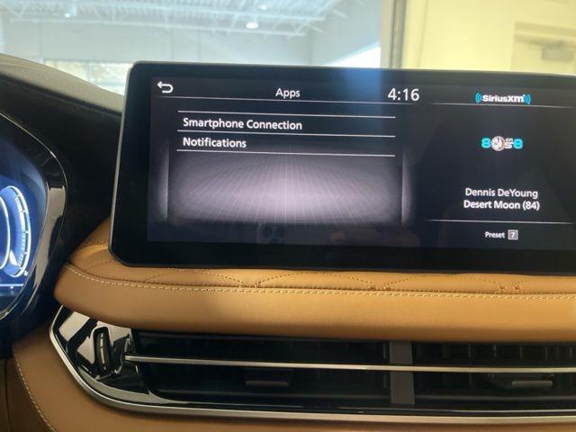 Photo of 2025 Warm Titanium/Black Obsidian INFINITI QX60