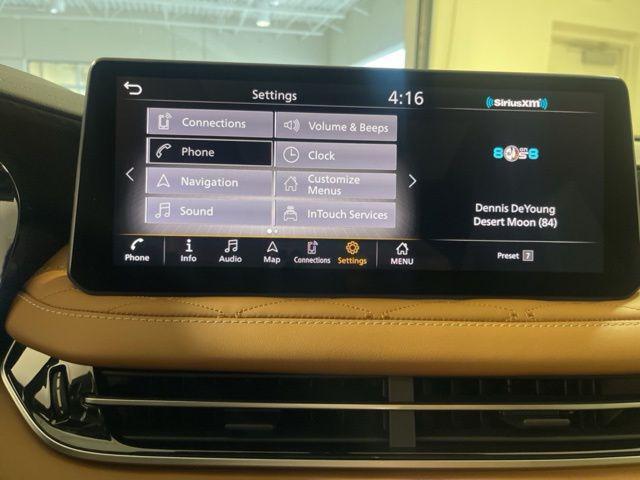 Photo of 2025 Warm Titanium/Black Obsidian INFINITI QX60
