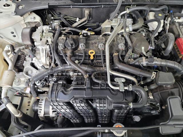 Photo of 2023 Pearl White Tricoat Nissan Altima