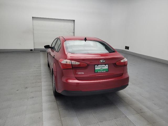 Photo of 2016 Crimson Red Metallic Kia Forte