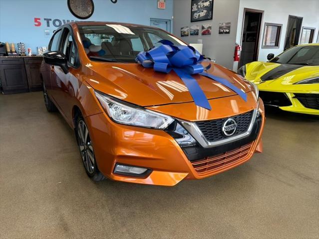 Photo of 2021 Monarch Orange Pearl Met Nissan Versa
