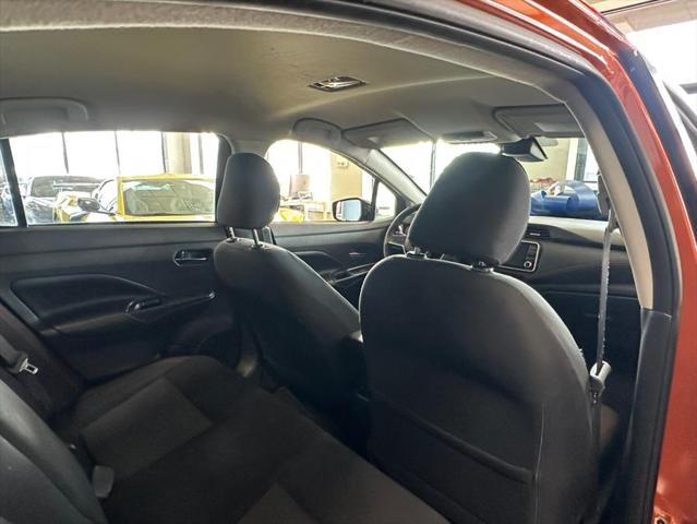 Photo of 2021 Monarch Orange Pearl Met Nissan Versa