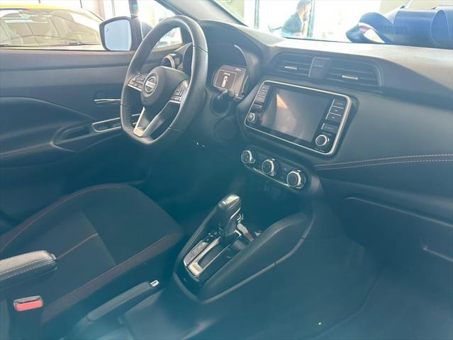 Photo of 2021 Monarch Orange Pearl Met Nissan Versa