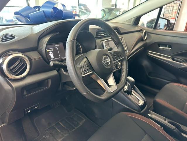 Photo of 2021 Monarch Orange Pearl Met Nissan Versa