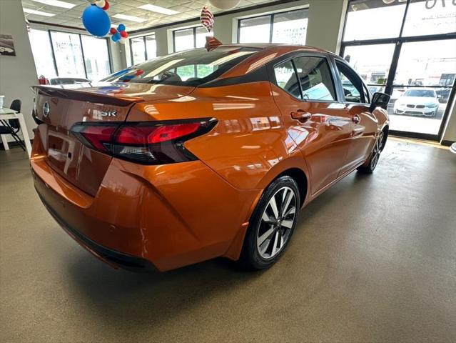 Photo of 2021 Monarch Orange Pearl Met Nissan Versa