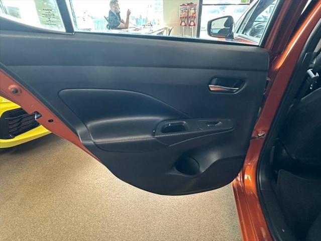 Photo of 2021 Monarch Orange Pearl Met Nissan Versa