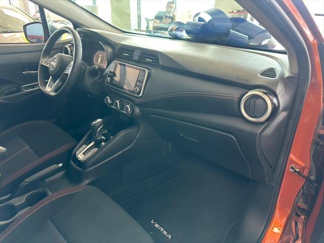 Photo of 2021 Monarch Orange Pearl Met Nissan Versa