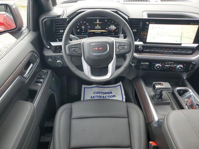 Photo of 2026 Volcanic Red Tintcoat GMC Sierra 1500