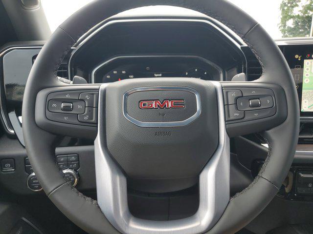 Photo of 2026 Volcanic Red Tintcoat GMC Sierra 1500