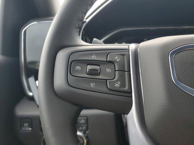 Photo of 2026 Volcanic Red Tintcoat GMC Sierra 1500