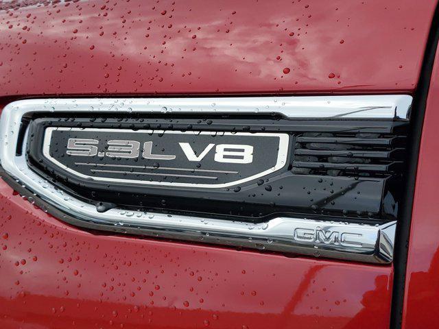 Photo of 2026 Volcanic Red Tintcoat GMC Sierra 1500