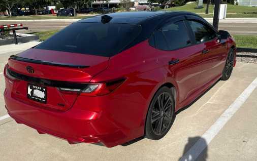 Photo of 2025 Supersonic Red/Midnight Black Metallic Toyota Camry