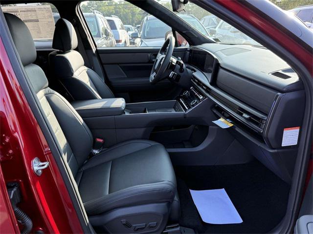 Photo of 2025 Ultimate Red Hyundai SANTA FE HEV