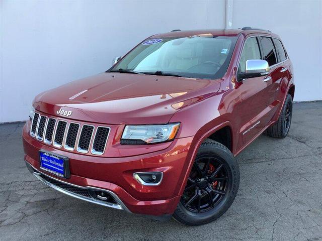 Photo of 2014 Deep Cherry Red Crystal Pearlcoat Jeep Grand Cherokee