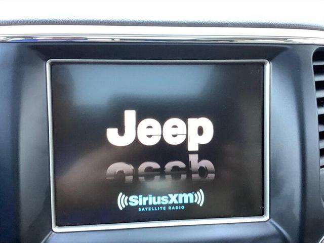 Photo of 2014 Deep Cherry Red Crystal Pearlcoat Jeep Grand Cherokee