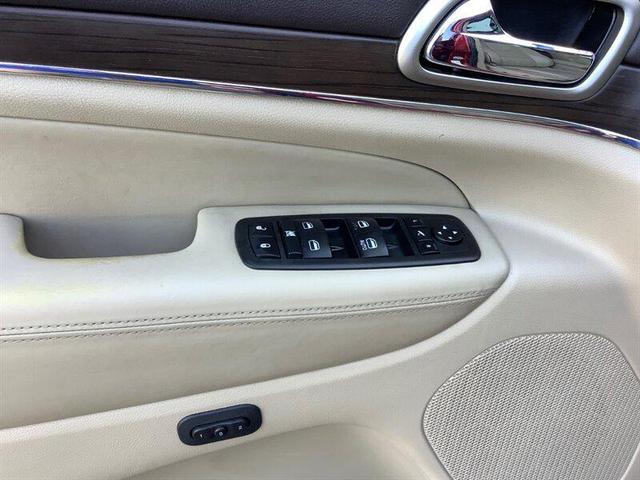 Photo of 2014 Deep Cherry Red Crystal Pearlcoat Jeep Grand Cherokee