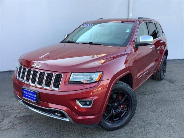 Photo of 2014 Deep Cherry Red Crystal Pearlcoat Jeep Grand Cherokee