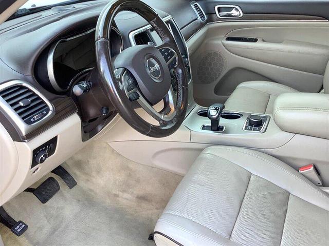 Photo of 2014 Deep Cherry Red Crystal Pearlcoat Jeep Grand Cherokee