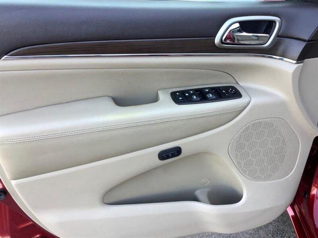 Photo of 2014 Deep Cherry Red Crystal Pearlcoat Jeep Grand Cherokee