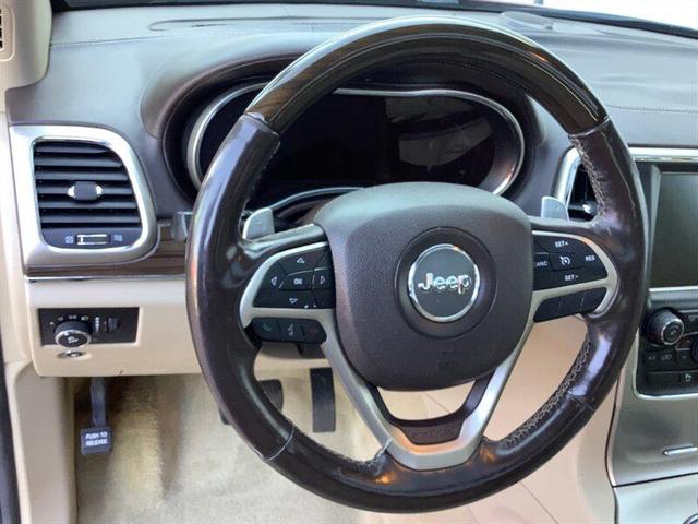Photo of 2014 Deep Cherry Red Crystal Pearlcoat Jeep Grand Cherokee